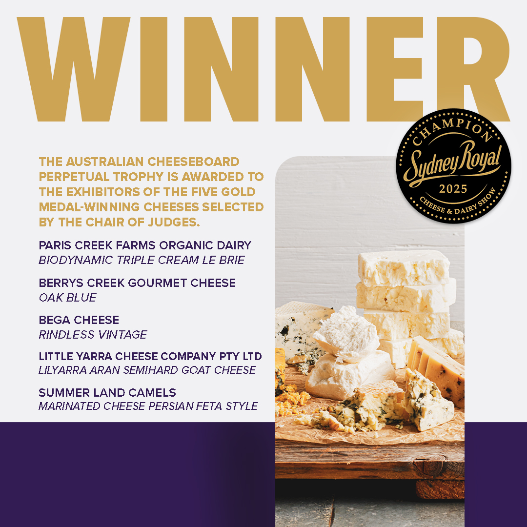 A cheese platter next to a recipient list of the Australian Cheeseboard Perpetual Trophy at Sydney Royal Cheese and Dairy Show.