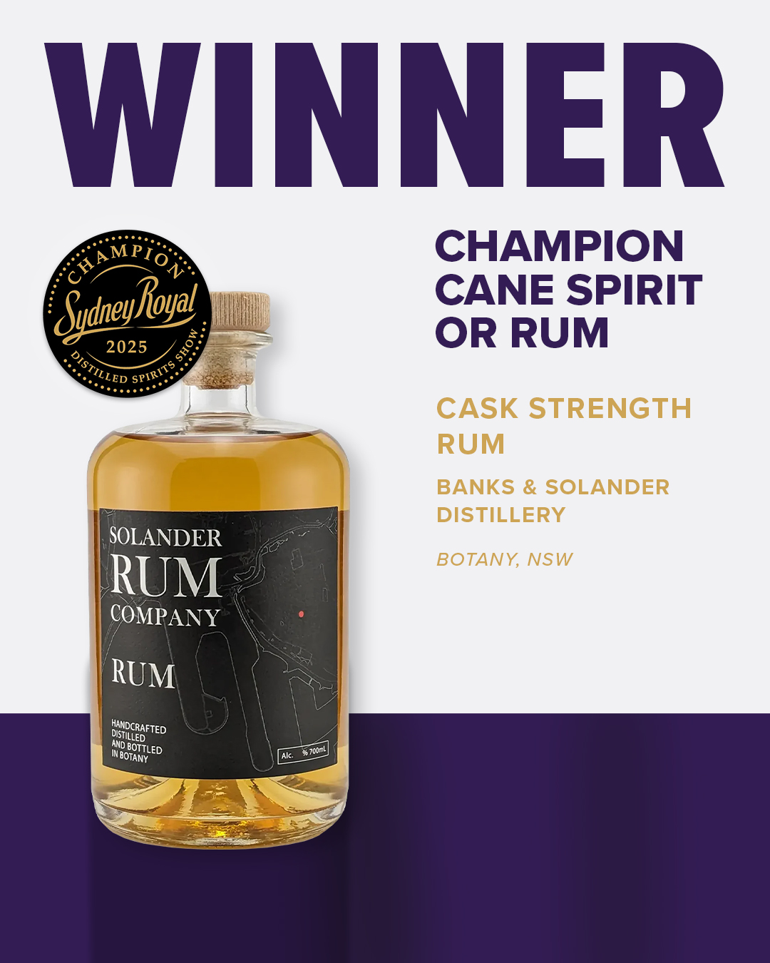 Golden spirit in clear bottle with black label and map design, awarded 2025 Sydney Royal Distilled Spirits Winner.